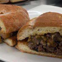 Philly Cheese Torta · Mexican Torta Bread, Beef fajitas, cremini mushrooms, bell peppers, onions, jalapeno cheese ...