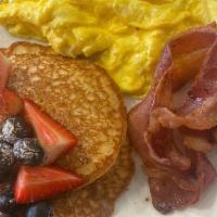 All American Breakfast · Eggs ( Cooked to Order), Bacon, short stack of pancakes and hashbrowns