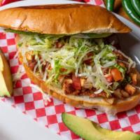 Torta · Mexican bun filled with your choice of fajita or pastor.