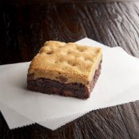 Brookie                   · A delicious combination of a rich fudge brownie and a chewy chocolate chip cookie.
