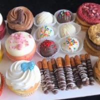 Celebration Box · A variety box with 6 assorted cupcakes, 6 cake pops, 1 dozen assorted cookies and 1 dozen di...