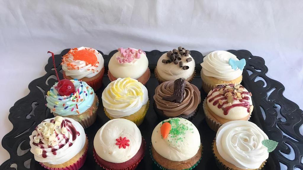 One Dozen Assorted Cupcakes · One dozen of our most popular flavors of the day.
