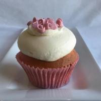Strawberry Cheesecake Cupcake · Our strawberry cake, strawberry filling and cream cheese icing topped with pink curls.