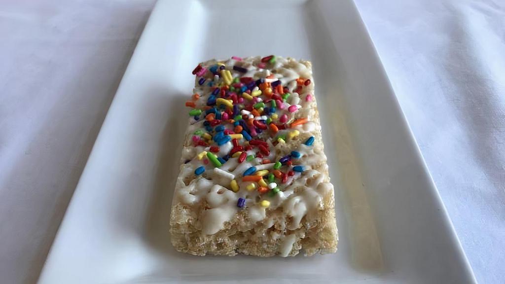 Rice Krispy Treat · Drizzled with white chocolate & topped with sprinkles, because. Sprinkles are for winners.
