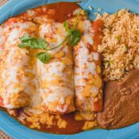 Chicken Enchiladas Verdes · Three corn tortilla chicken enchiladas smothered with green sauce and melted cheese, with so...