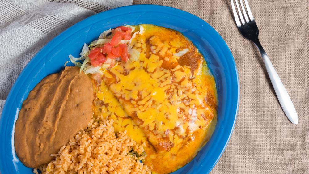 Cheese Enchiladas · Two cheese enchiladas smothered with our traditional chili gravy and topped with melted cheese, rice, and beans.