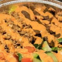 P20 Spicy Orange Sauce · Rice and Salad Rice Bowl with an Option of One or 2 of Meat or Veggies , Drizzled With Our N...