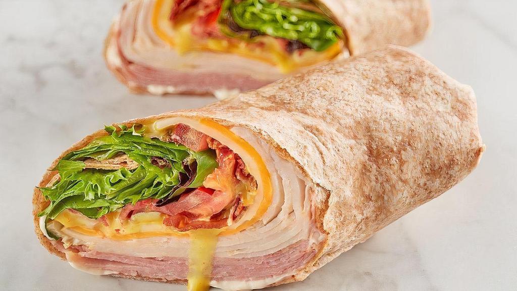 Mcalister'S Club Wrap · Cut the carbs without cutting the taste.. Get our famous McAlister’s Club with smoked turkey, Black Forest ham and everything on it except the bread. Wrap it up in a wheat wrap instead.