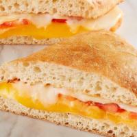 Four Cheese Melt · Provolone, Swiss, cheddar, Parmesan and tomato on toasted ciabatta.