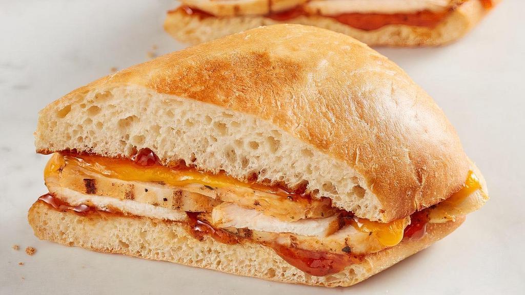 Sweet Chipotle Chicken  · Grilled chicken, sharp cheddar and spicy sweet chipotle peach sauce on toasted ciabatta.