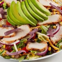 Southwest Chicken & Avocado Salad · Grilled chicken, roasted corn, pobablano and black bean relish, red onion, tomato, cheddar-j...