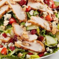 Savannah Chopped Salad · Grilled chicken, dried cranberries, Gorgonzola, honey roasted almonds, tomato and cucumber o...