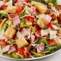 Chef Salad  · Diced Turkey and ham, bacon, cheddar-jack, tomato, cucumber and croutons on mixed greens.