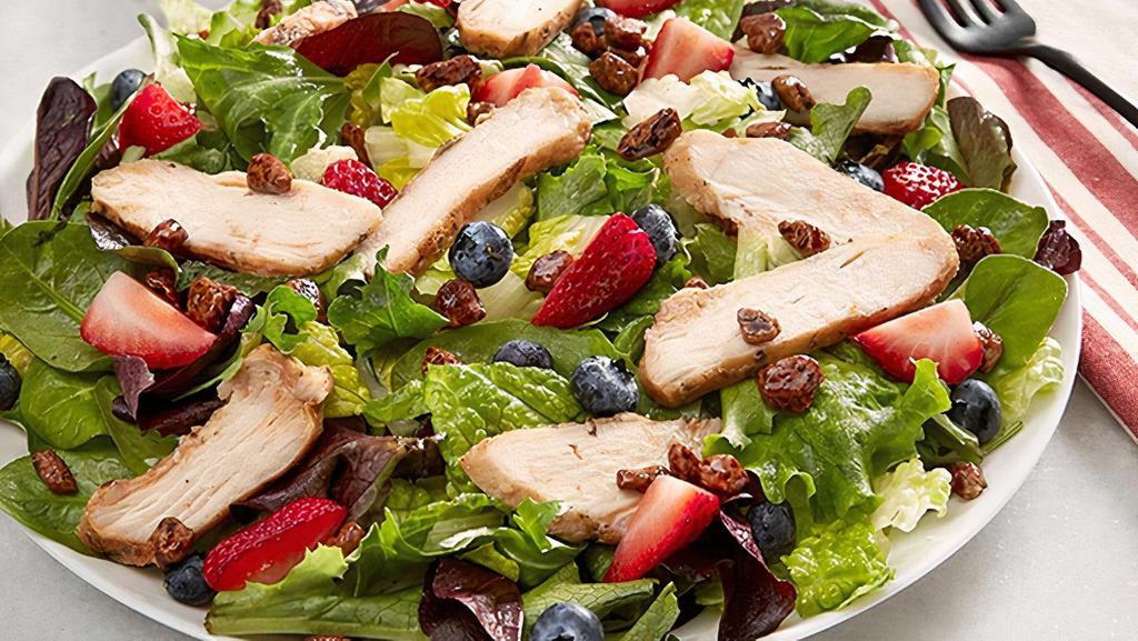 Pecanberry Salad · Grilled chicken, fresh strawberries and blueberries, candied pecans with fat-free raspberry pecan vinaigrette on mixed greens.