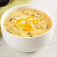 Broccoli & Cheddar Soup · Cheddar and Monterrey Jack Cheese mixed with chunks of Broccoli in a creamy base made from c...
