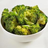 Steamed Broccoli · Lightly seasoned steamed broccoli.