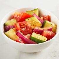 Tomato & Cucumber Salad · A blend of tomatoes and cucumbers with sliced red onions and mixed with balsamic vinaigrette.
