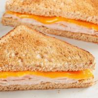 Kid'S Turkey Toastie · All-natural cheddar cheese with turkey on toasted wheat bread.