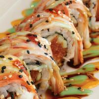 Dallas Roll · Shrimp tempura, cream cheese, cucumber roll topped with crab meat and eel and spicy mayo sau...