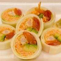 Rock & Roll · Cucumber wrap, shrimp tempura, salmon, tuna, crab salad, avocado and masago.