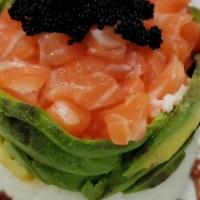 Salmon Tower · Tower of spicy salmon, crab meat, avocado, rice with special sauce and caviar.