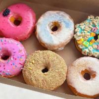 Half Dozen Assorted · mix of our most popular donut flavors chosen by our incredible bakers