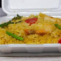 Thai Fried Rice · Thai style stir-fried with egg, tomatoes, and yellow + green onions.