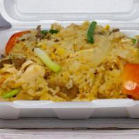 Combination Meat Fried Rice · Stir-fried Thai style combination meats (chicken, pork, and beef) with egg, tomatoes, and ye...