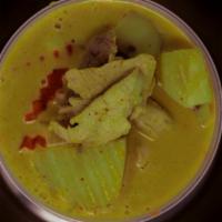 Yellow Curry · Potatoes, yellow onions and carrots cooked in yellow curry and coconut milk. Side of Jasmine...