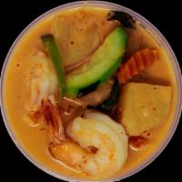 Pineapple Curry · Pineapple, bamboo shoots, zucchini, bell peppers, carrots, and basil, cooked in red curry sa...
