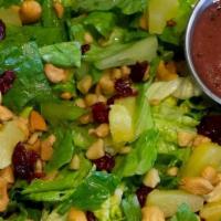 Sm Nutty Hawaiian Salad · Romaine lettuce topped with sun-dried tomatoes, pineapple, cashews, dried cranberries, and o...