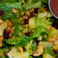 Lg Nutty Hawaiian Salad · Romaine lettuce topped with sun-dried tomatoes, pineapple, cashews, dried cranberries, and o...