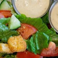 Kids Garden Salad · Small. Romaine lettuce topped with cucumbers, tomatoes, black olives, croutons, and dressing...