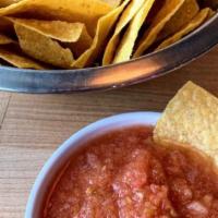 Chips And Salsa (Feeds 1 - 2) · Our salsa is made fresh everyday with tomatoes, lime, jalapeños, cilantro and secret spices....