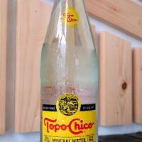 Topo Chico · All natural sparkling mineral water.
