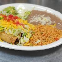 Chicken Flautas · Two large corn tortillas stuffed with shredded chicken, rolled and fried. Served with a side...