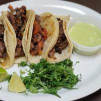 Authentic Street Tacos · Four authentic street tacos with choice of two meats: pastor, beef fajita, chicken fajita or...