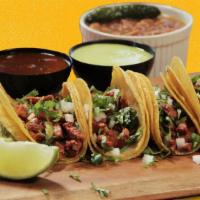 6 Street Tacos-Al Pastor · Six tacos in mini-tortillas, pork. Comes with charro beans.