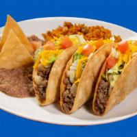 Crispy Tacos Picadillo Plate · Three pieces. Includes rice, refried beans, and tortillas.