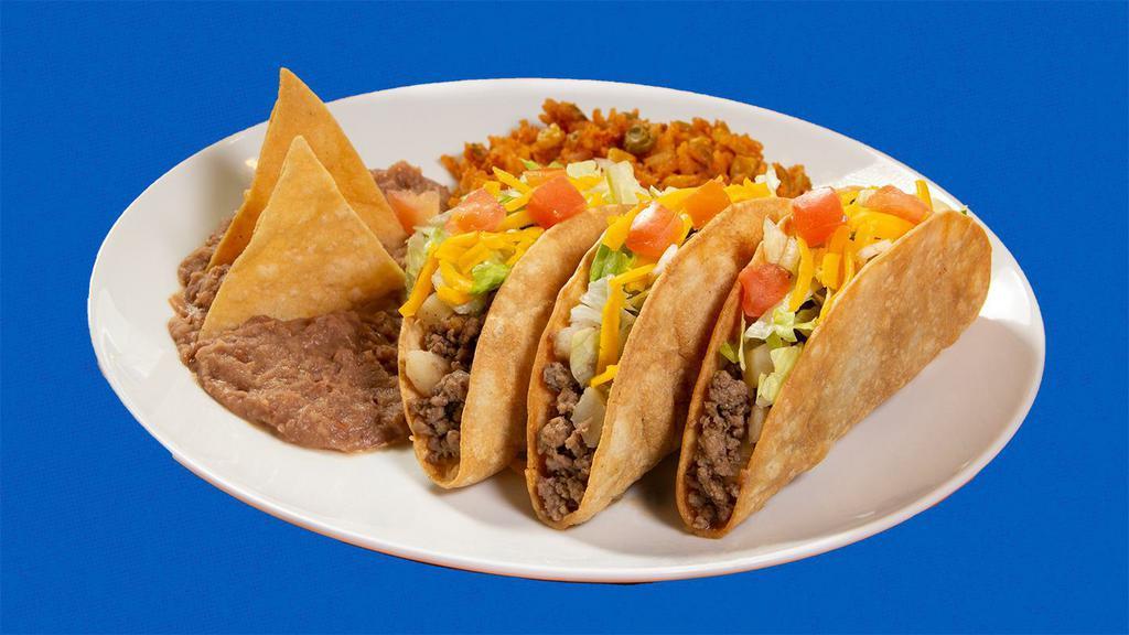 Crispy Tacos Picadillo (3) · These three taco p-styled crispy tacos come with Mexican red rice and refried beans.