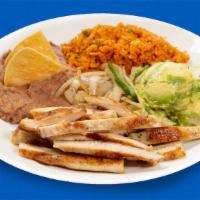 Chicken Fajitas · The chicken breast served in this dish is marinated for hours in real fruit juices, spices, ...