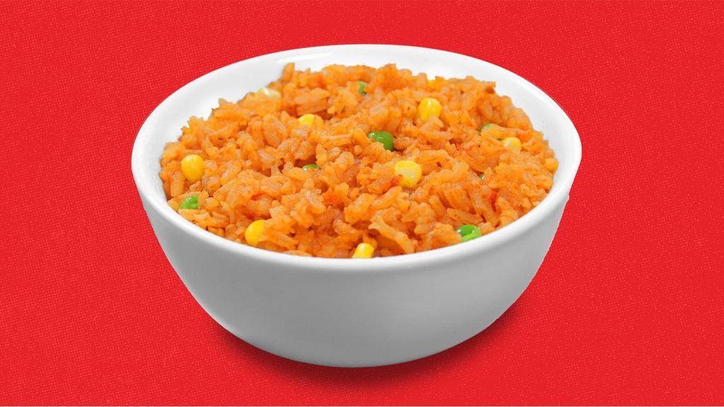 Rice (Regular) · Enjoy our dishes with some traditional Mexican red rice mixed with peas, corn, and sautéed tomatoes.