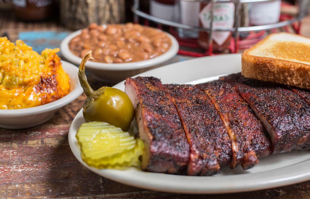 1 Meat Plate · Includes choice of two sides and Texas toast.