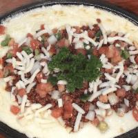 Queso Flameado · Melted cheese with a choice of: Veggie or Chorizo for $10.99 / Beef or Chicken for $11.99 / ...