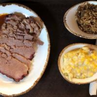Brisket Dinner · Includes a choice of two sides, condiment bar and bread.