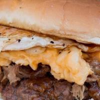 Smoke Stack Burger · Angus beef stacked with pulled pork, mac & cheese, fried egg, slaw, mayo