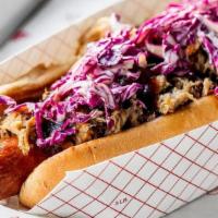 Big Frank · Foot long dog topped with pulled pork, BBQ sauce, slaw