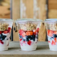 Fruit & Yogurt Parfait · Dairy free vanilla yogurt, organic berries, gluten free granola.