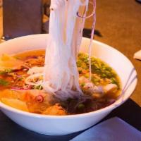 Pho Tai Nam (Extra Large) · Eye of round steak and well-done flank.