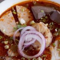 Bun Bo Hue (Extra Large) · Thick vermicelli with lemongrass beef broth, sliced beef, sliced pork, pig feet and blood ca...